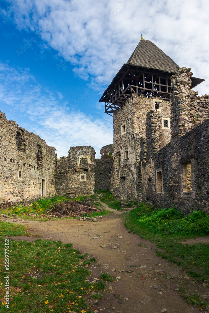 inner courtyard with main tower of Nevytsky castle ruins. popular travel attraction of TransCarpathia