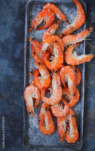 Fresh prawns on metal grey tray