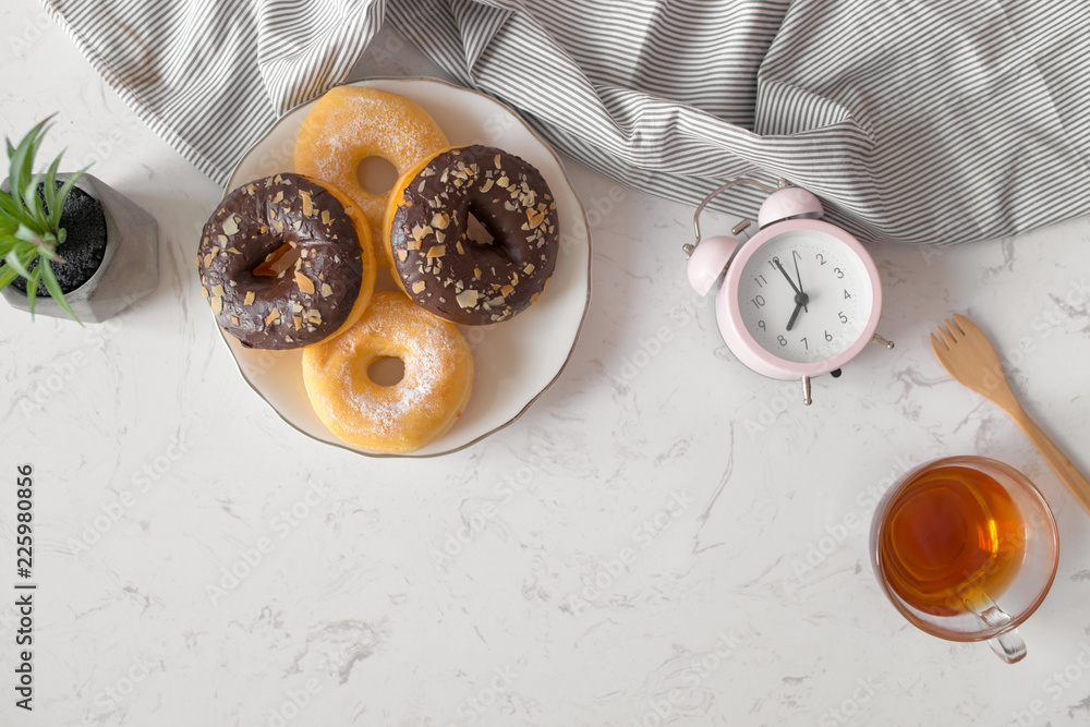 Classic donut. Morning breakfast on table in living room at home.