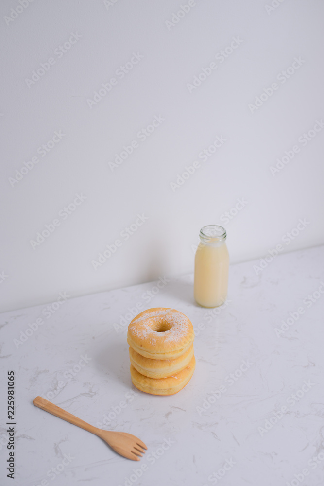 Classic donut. Morning breakfast on table in living room at home. Classic donut. Morning breakfast on table in living room at home.