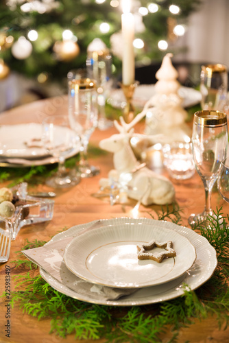 a colorful and festive christmas table setting