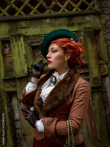 Quadro em tela Beautiful woman face in the hat and red hair