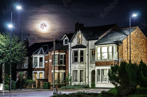 Halloween Concept creepy house with full moon