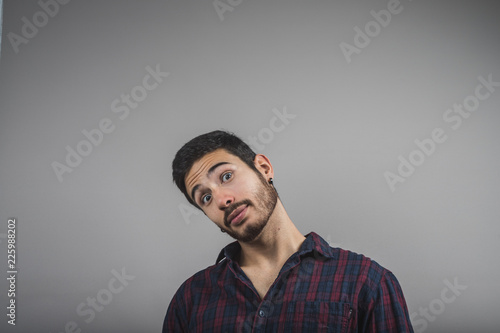 portrait of young man tilting his head