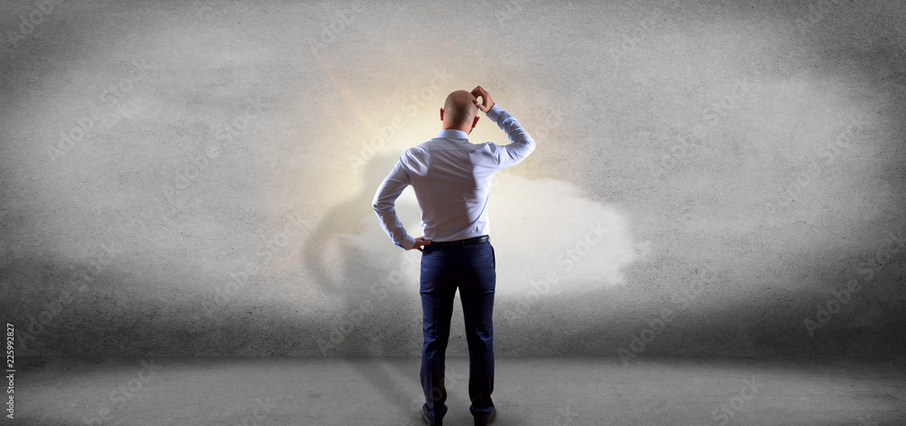 Obraz premium Businessman in front of a Weather forecast Sun and cloud