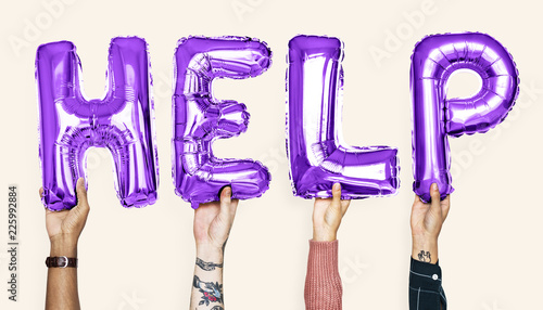 Purple alphabet balloons forming the word help photo
