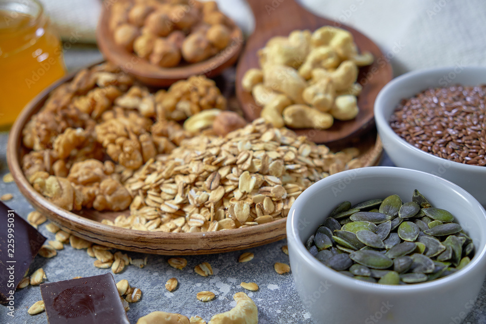 Various nuts on stone table. Top view with copy space Various nuts on stone table. Top view with copy space