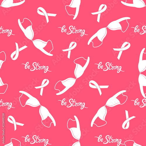 Bra, pink ribbon. Be strong Motivational hand drawn inscription. National Breast Cancer Awareness Month seamless pattern.