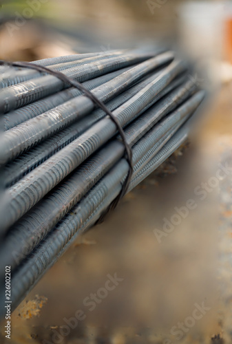 Close up steel bar in construction site, steel bar texture, reinforcement for cement/concrete layer. Strong Element of construction concept.