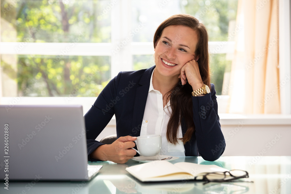 Contemplated Happy Businesswoman With Cup Of Coffee Contemplated Happy Businesswoman With Cup Of Coffee