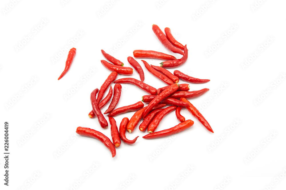Chili pepper - The Chili pepper plants to the nature of the sphere of the long spikes of pale red, have a spicy and Chili peppers are widely used in many cuisines isolated white background Chili pepper - The Chili pepper plants to the nature of the sphere of the long spikes of pale red, have a spicy and Chili peppers are widely used in many cuisines isolated white background