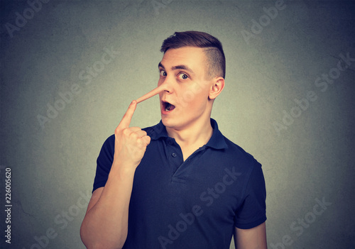 Man with long nose of deceiver