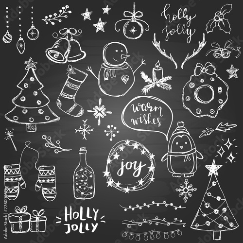 Set of cute and simple hand drawn Christmas elements on the blackboard background