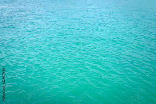 Blue sea surface with waves