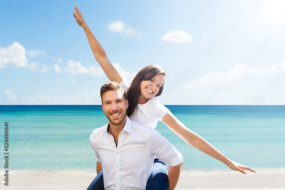 Beautiful Young Couple At Beach Beautiful Young Couple At Beach