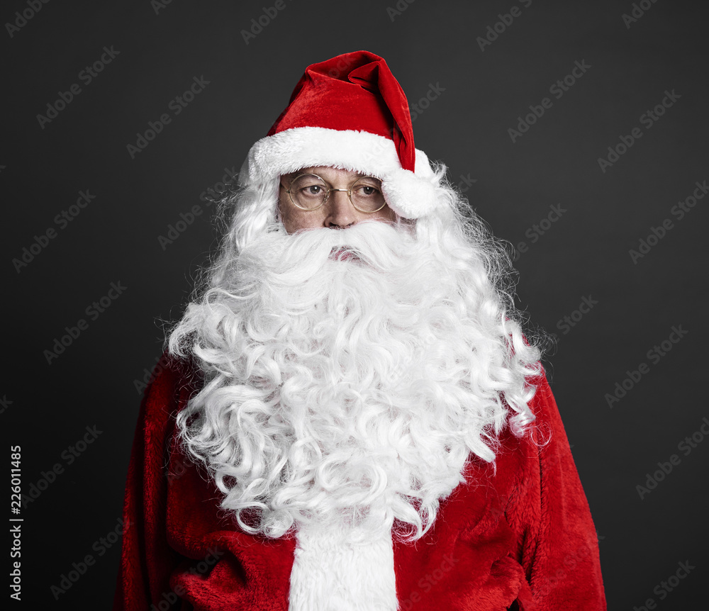 Portrait of tired santa claus at studio shot  .