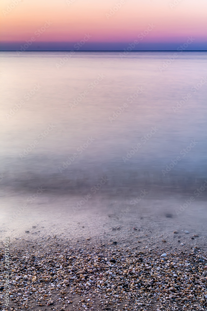 Fototapeta premium Abstract blurry dramatic Sunset in Long Exposure for background