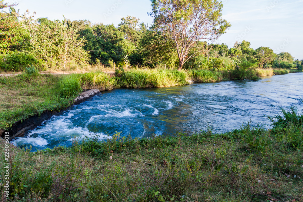 Water canal near Udawalawe National village, Sri Lanka