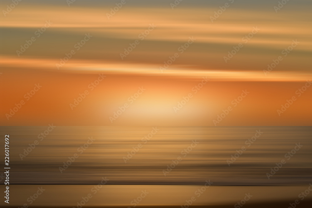 A background resembling the sea in a sunrise