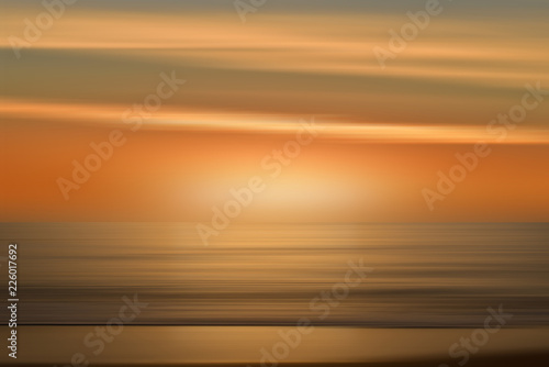 A background resembling the sea in a sunrise