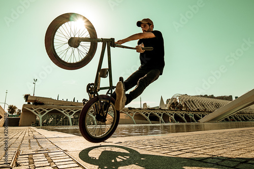 Guy riding a bmx bike .Extreme street sport Fototapet