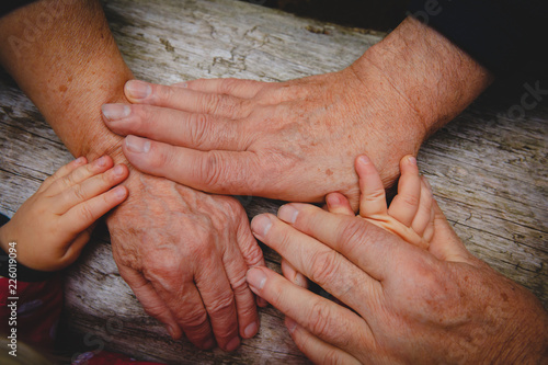 grandparents and kids hands, concept of family