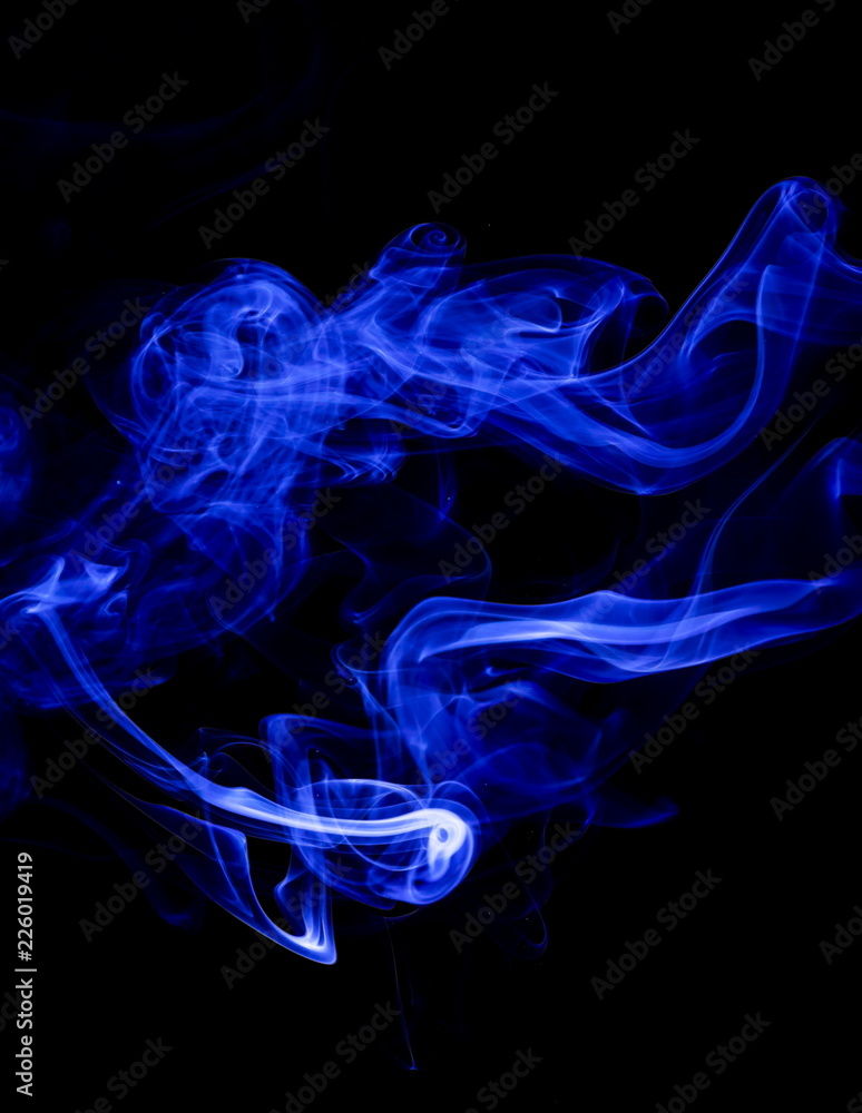 Plakat Blue smoke on black background