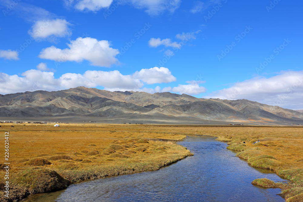 Autumn Landscape of reflection of the river near the village in Western Mongolia