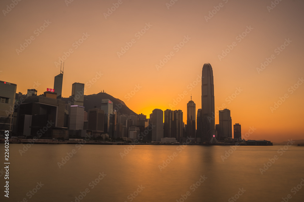 Hong Kong skyline with a beautiful sunset behind