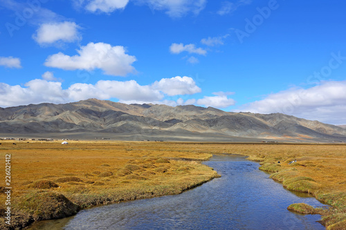 Autumn Landscape of reflection of the river near the village in Western Mongolia © isarescheewin