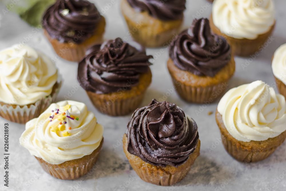 Birthday cupcake with the chocolate frosting on the top Birthday cupcake with the chocolate frosting on the top
