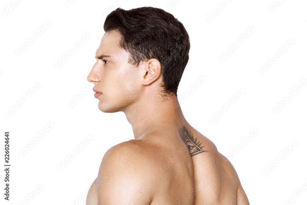 Strong muscle beautiful stripped male model in fashion cloathes on white isolated fontk background