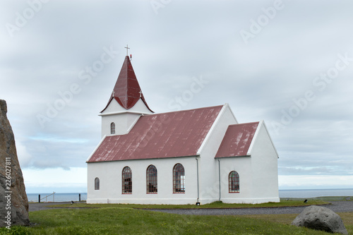 Ingjaldshólskirkja red roof church near Hellissandur  photo