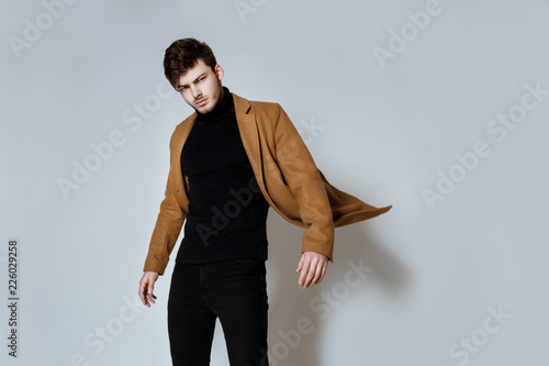 Handsome strong face male model wearing casual cloathing on isolated background photo