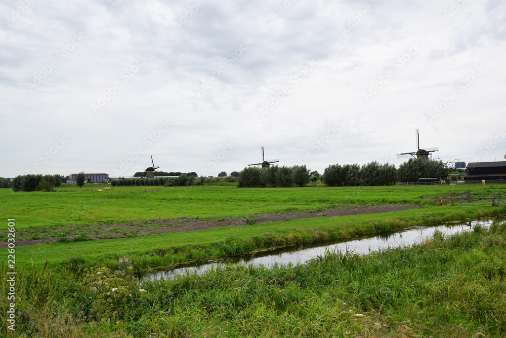 Kinderdijk, Netherlands - Windmills along the canals of the UNESCO World Heritage Kinderdijk Kinderdijk, Netherlands - Windmills along the canals of the UNESCO World Heritage Kinderdijk