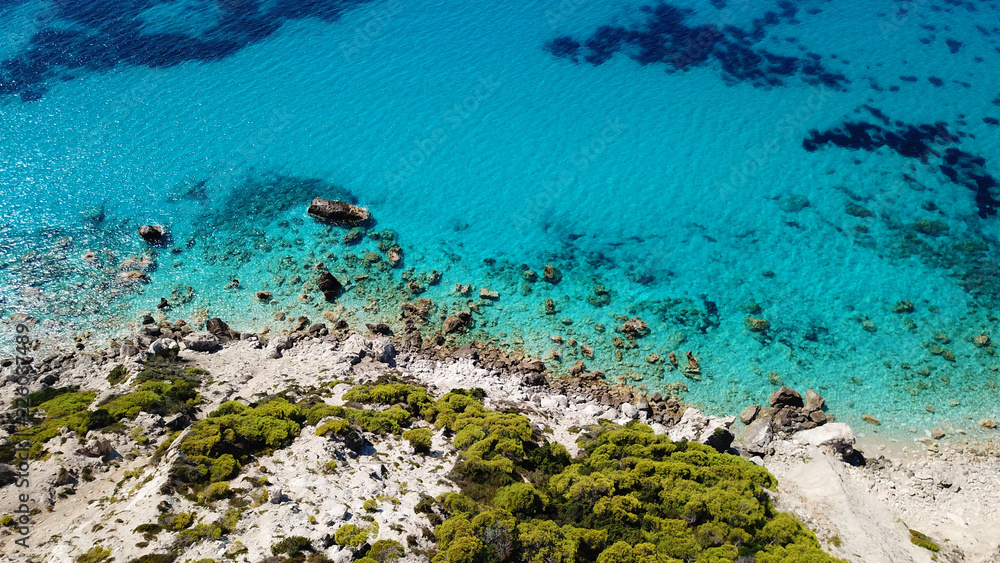 Aerial bird's eye view photo taken by drone of tropical white sandy beach with turquoise clear waters