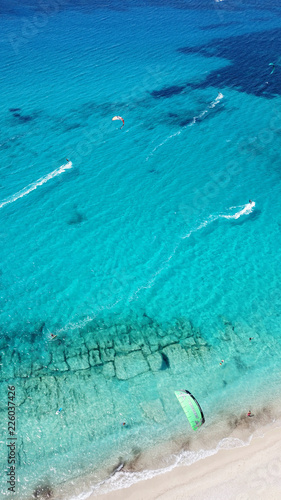 Aerial bird's eye view photo taken by drone of tropical white sandy beach with turquoise clear waters