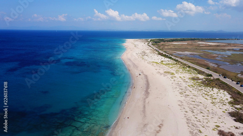 Aerial bird s eye view photo taken by drone of tropical white sandy beach with turquoise clear waters