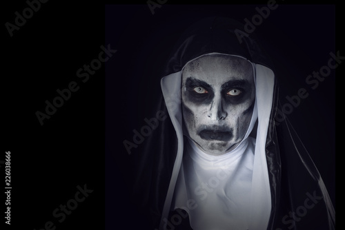 portrait of a frightening evil nun