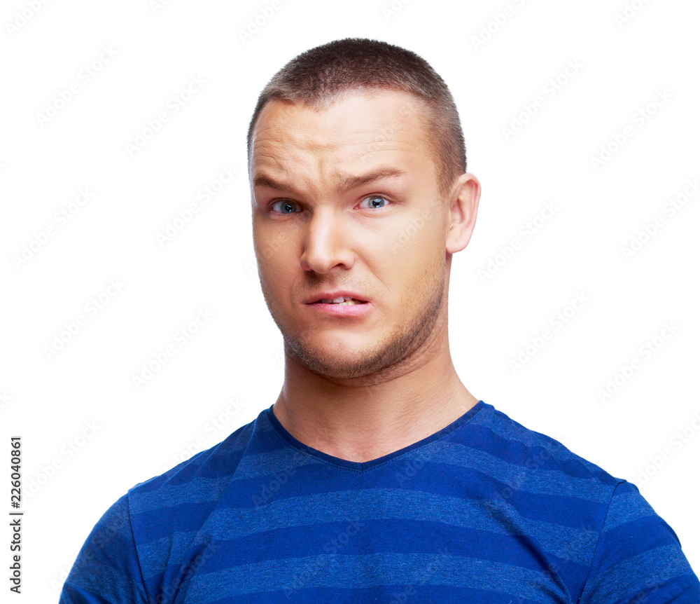 Fototapeta premium portret przystojny, młody człowiek, który czegoś nie lubi