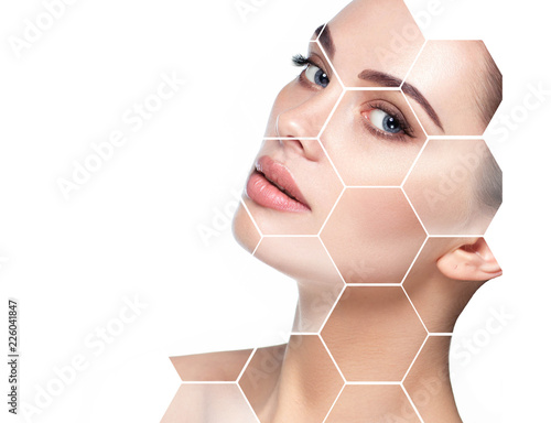 beautiful face woman with holographic honeycomb in face. Future concept of lifting skin effect and plastic surgery.