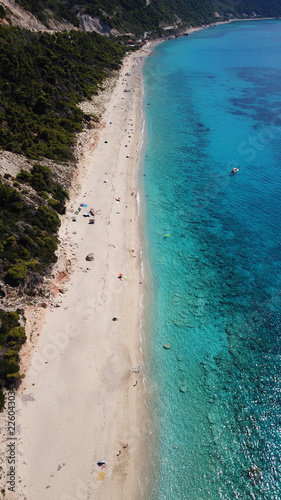 Aerial drone bird's eye view photo of small rocky beach next to iconic beach of Milos and Agios Nikitas in island of Lefkada, Ionian, Greece © aerial-drone