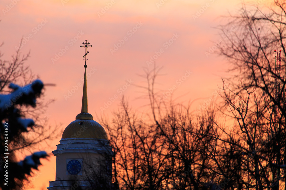 Orthodox church in Russia against the backdrop of the sunset Orthodox church in Russia against the backdrop of the sunset