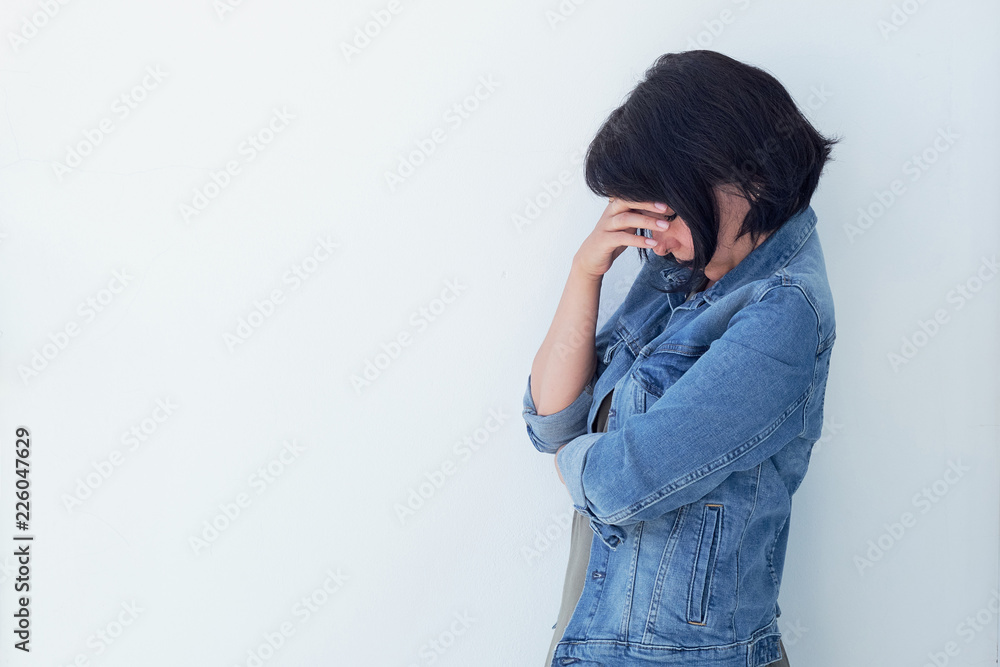 Photo of Expression of lonely female teenager at home. Portrait of a sad teenage girl looking thoughtful about troubles. Pensive teen. Depression, teen depression, pain, suffering. Photo of Expression of lonely female teenager at home. Portrait of a sad teenage girl looking thoughtful about troubles. Pensive teen. Depression, teen depression, pain, suffering.