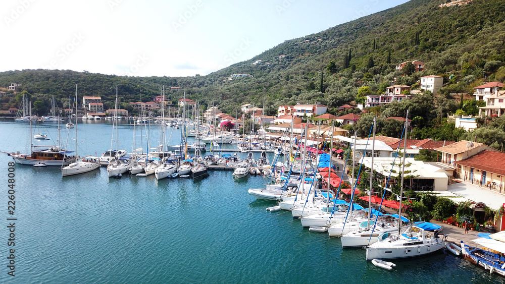 Aerial drone photo of famous seaside village and bay of Sivota Lefkadas famous for trips to nearby beaches and dafe harbouring to sail boats, Lefkada, Greece