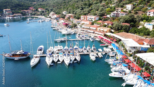 Aerial drone photo of famous seaside village and bay of Sivota Lefkadas famous for trips to nearby beaches and dafe harbouring to sail boats, Lefkada, Greece © aerial-drone