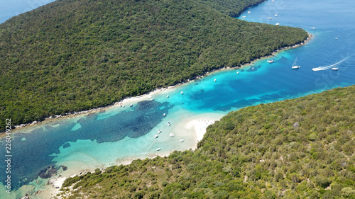 Aerial photo of tropical caribbean exotic bay with turquoise clear sea and white rocky seascape