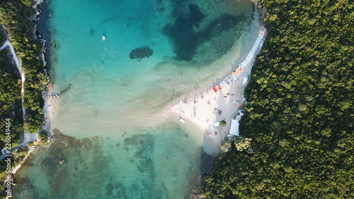 Fototapeta Naklejka Na Ścianę i Meble -  Aerial drone photo of tropical caribbean bay with white sand beach and beautiful turquoise and sapphire clear sea