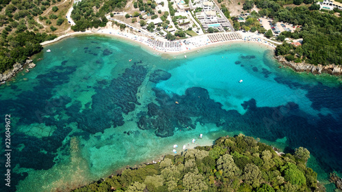 Aerial drone bird's eye view photo of famous sandy beach and small island of Agia Paraskevi with emerald clear sea, Thesprotia, Epirus, Greece © aerial-drone