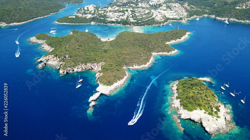 Aerial drone bird's eye view photo of iconic paradise sandy beaches with turquoise sea in complex islands of Agios Nikolaos and Mourtos in Sivota area, Ionian sea, Epirus, Greece